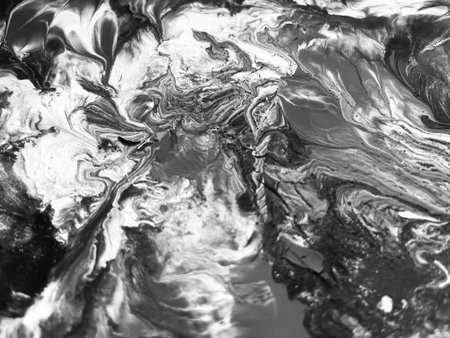 Close Up Black and White Colors Fluid Pouring Abstract Art Acrylic Painting Texture Backgroundの写真素材