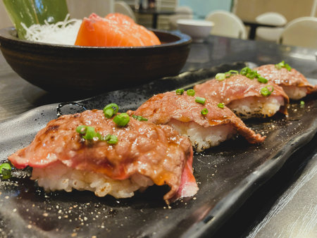 Sushi on Plate Japanese Food Backgroundの写真素材