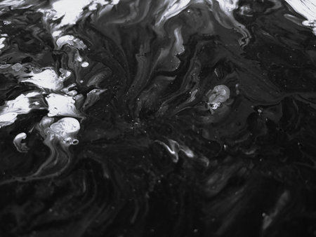 Close Up Black and White Colors Fluid Pouring Abstract Art Acrylic Painting Texture Backgroundの写真素材