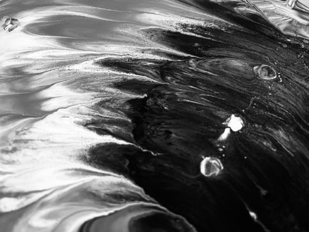 Close Up Black and White Colors Fluid Pouring Abstract Art Acrylic Painting Texture Background