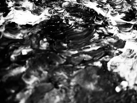 Close Up Black and White Colors Fluid Pouring Abstract Art Acrylic Painting Texture Backgroundの写真素材