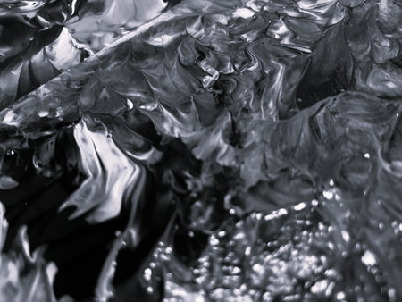 Close Up Black and White Colors Fluid Pouring Abstract Art Acrylic Painting Texture Backgroundの写真素材