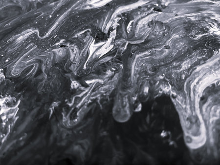 Close Up Black and White Colors Fluid Pouring Abstract Art Acrylic Painting Texture Backgroundの写真素材