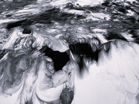 Close Up Black and White Colors Fluid Pouring Abstract Art Acrylic Painting Texture Background