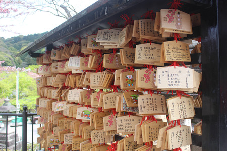 Kiyomizu-dera Temple Kyoto,, Japan - April 11, 2016: A Japanese votive plaque(Ema) hanging in Kiyomizu temple,Ema are small wooden plaques used for wishes by shinto believers.のeditorial素材