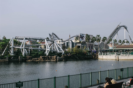 Osaka, Japan - April 12, 2016: Roller coaster in Universal Studios Theme Park in Osaka, Japan on - April 12, 2016. The theme park has many attractions based on the film industry.のeditorial素材