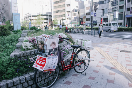 Osaka, JAPAN - April 13, 2016 : A bike on street of old town, kita-ku, Osaka, Japanのeditorial素材