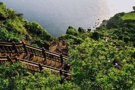 Stairs to climb Seongsan mountain in Jeju Island, South Korea.の写真素材