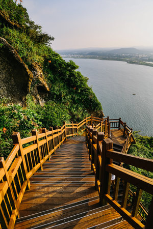 Stairs to climb Seongsan mountain in Jeju Island, South Korea.の写真素材