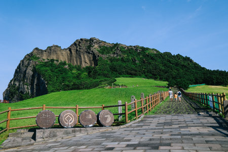 Jeju Island, South Korea - July 10, 2022: Seongsan Ilchulbong, also called 'Sunrise Peak'. Situated on the eastern seaboard of Jeju Island, South Korea.のeditorial素材