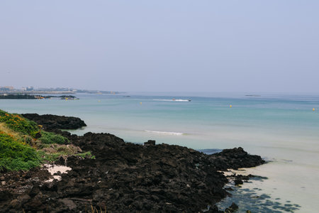 Scenic view of hamdeok beach in Jeju Island, South Korea.の写真素材