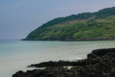 Scenic view of hamdeok beach in Jeju Island, South Korea.の写真素材