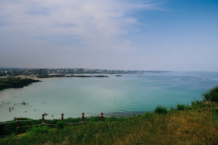 Scenic view of hamdeok beach in Jeju Island, South Korea.の写真素材