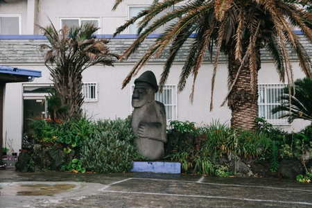 Stone statue grandfather or Dol hareubang in Jeju Island, South Korea.の写真素材