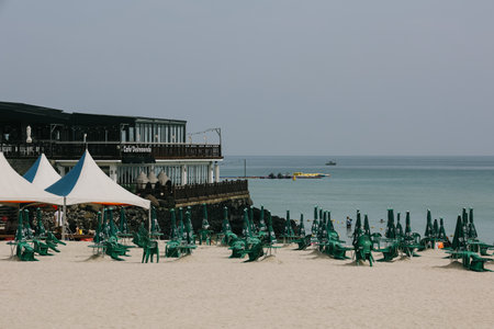 Jeju Island, South Korea - July 10, 2022: The lined parasols on Hamdeok Beach, Jeju Island.のeditorial素材