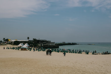Jeju Island, South Korea - July 10, 2022: Many people are splash at hamdeok beach in summer, Jeju Island, South Korea.のeditorial素材