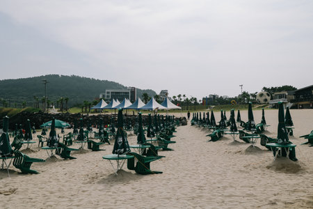 Jeju Island, South Korea - July 10, 2022: The lined parasols on Hamdeok Beach, Jeju Island.のeditorial素材
