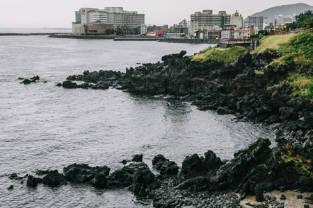 Yongduam Rock. Yongduam is a dragon head-like rock and one of the famous attraction in Jeju city.のeditorial素材