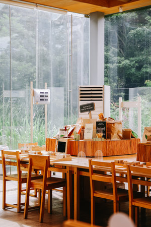 Jeju, South Korea - July 11, 2022: Innisfree Jeju House in summer. It's a flagship store and cafe in Jeju Island, where you can experience and purchase Innisfree cosmetic products.のeditorial素材