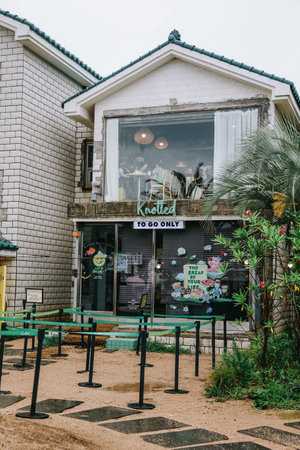 Jeju, South Korea - July 11, 2022: Cafe Knotted Jeju Aewol branch, it's famous cafe in South Korea that specialise in donuts.のeditorial素材