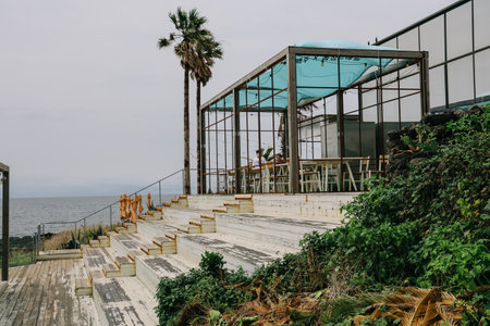 Jeju, South Korea - July 11, 2022: Overview of the cafe street in Aewol, Jeju.のeditorial素材