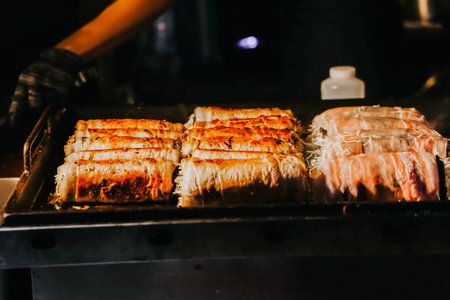 One of the delicious street food dish at the Dongmun Night Market.This is one of Jeju famous tourist...