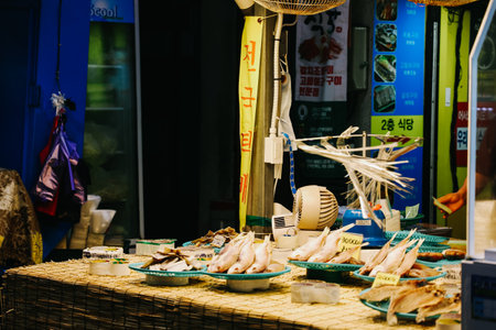 Jeju Island, South Korea - July 11, 2022: Fresh seafood that selling at Dongmun market, Jeju island. Dongmun Night Market is the one of Jeju famous tourist spot and street food.のeditorial素材