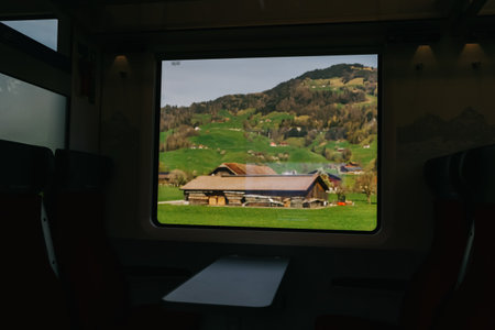 Wonderful view of Switzerland in spring from the window of train. Soft and blur focus.の写真素材