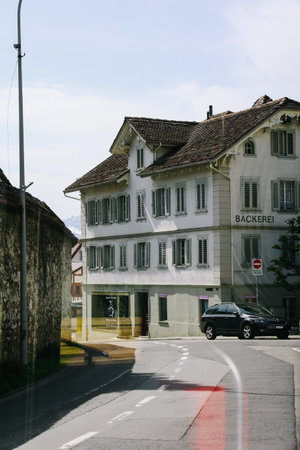 Schwyz, Switzerland - April 12, 2022: Street view of the Swiss canton of Schwyz, seen from bus in  Switzerland.のeditorial素材