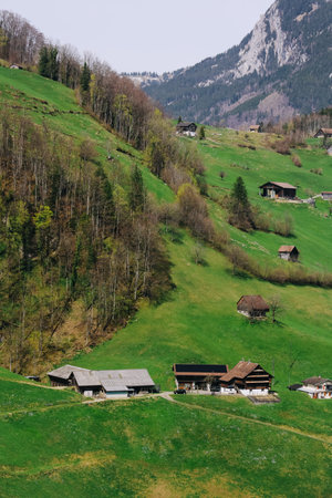 Scenic mountain village surrounded by the mountain, Canton Schwyz, Switzerland, Europe.の写真素材
