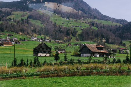 Scenic mountain village surrounded by the mountain, Canton Schwyz, Switzerland, Europe.