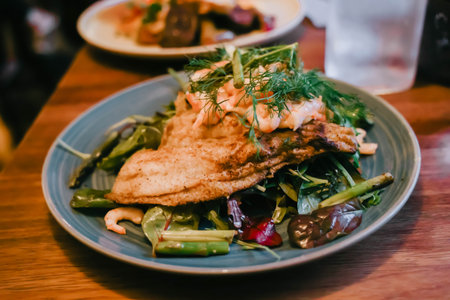 Chicken and shrimps are grilled with vegetables on dish, Danish food.の写真素材