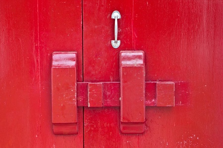 Red wooden door in temple Thailand