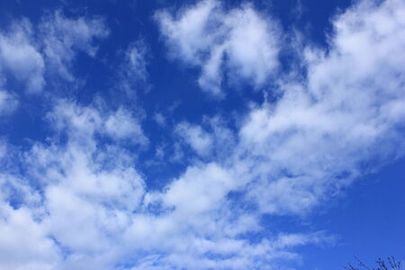Blue sky white cloudsの写真素材