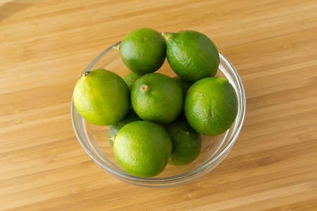 Lime on wood backgroundの写真素材