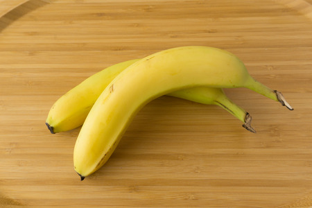 Banana on wood backgroundの写真素材