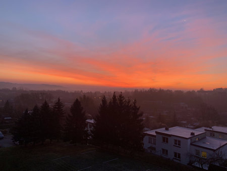 Sunset over the city in the winter. Colorful sky.の写真素材