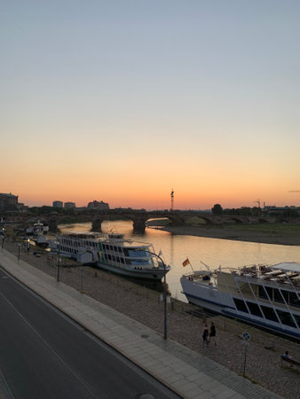 Tourist boats on the river Elbe at sunset.の写真素材