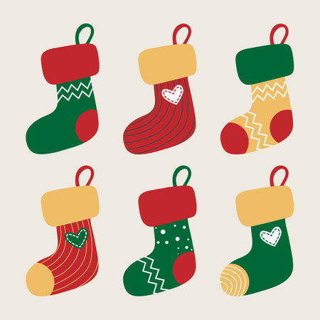 Set of red, green, yellow socks. Christmas stockings. Stickers, clip art for Christmas. Hanging stockings highlighted on a white background. Vector illustration. Holiday giftsのイラスト素材
