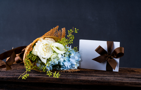 Flower and card as a background.の写真素材