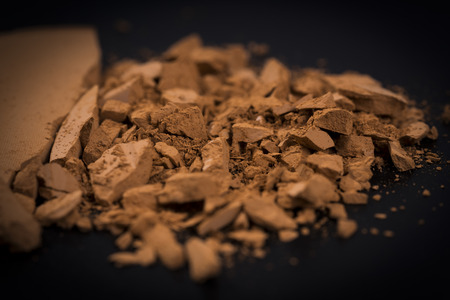 Compact powder on black background./ Compact powder.の写真素材