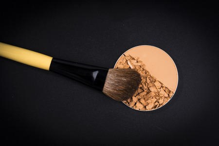 Compact powder on black background./ Compact powder.の写真素材