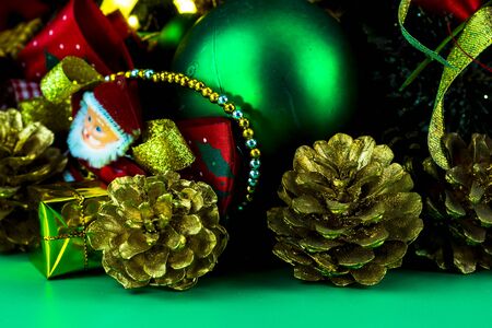 Christmas decoration on green background.の写真素材