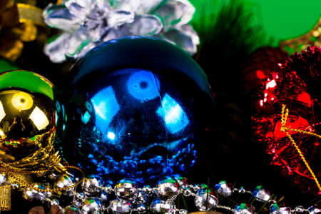 Christmas decoration on green background.