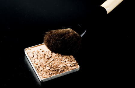 Brown color of compact foundation powder with brush.の写真素材