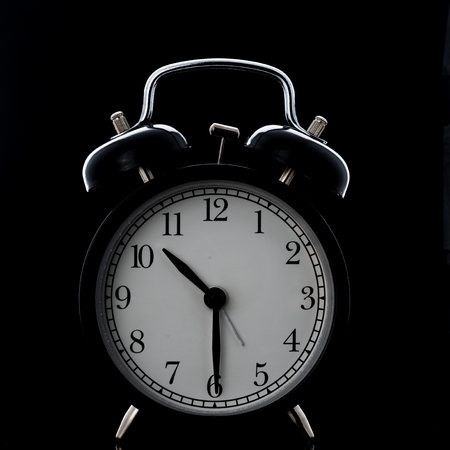 Clock on black background