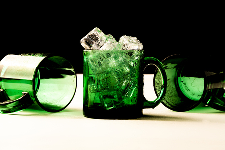 Bangkok, Thailand - July 22, 2018 : Transparency green mug with  ice, illustrative editorial.のeditorial素材