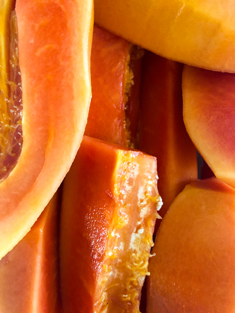 Cut papaya as a backgroundの写真素材