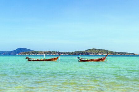 Traditional thai longtail boat, in Phuket Thailandの写真素材
