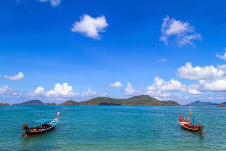 Traditional thai longtail boat, in Phuket Thailandの写真素材